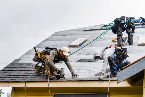 Professional Gutter Installation technician working in Madison, MD